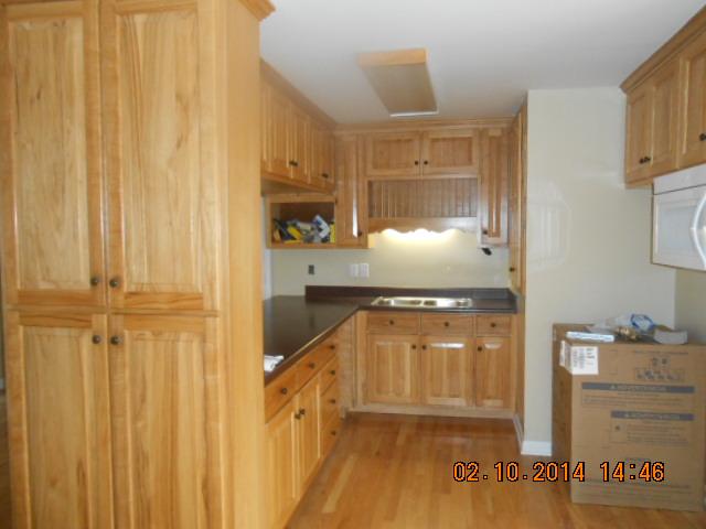 10210 New Hope Road Bon Aqua, TN 37025 - Photo 6 of 16 HICKORY CUSTOM BUILT KITCHEN CABINETS. HAS A BAR FOR QUICK MEALS. HARDWOOD FLOORS.