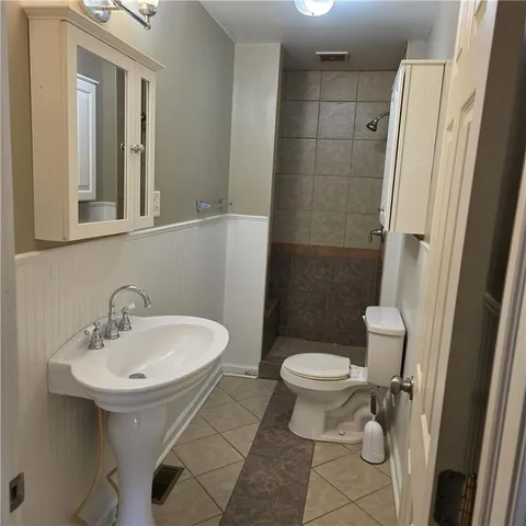 a view of an empty room with stairs