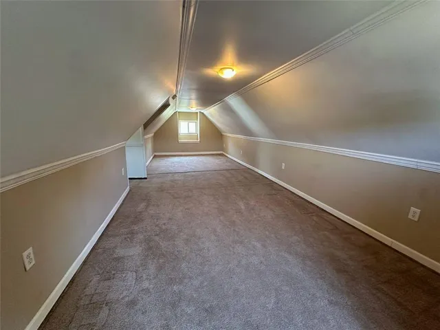 a view of a lake with a house