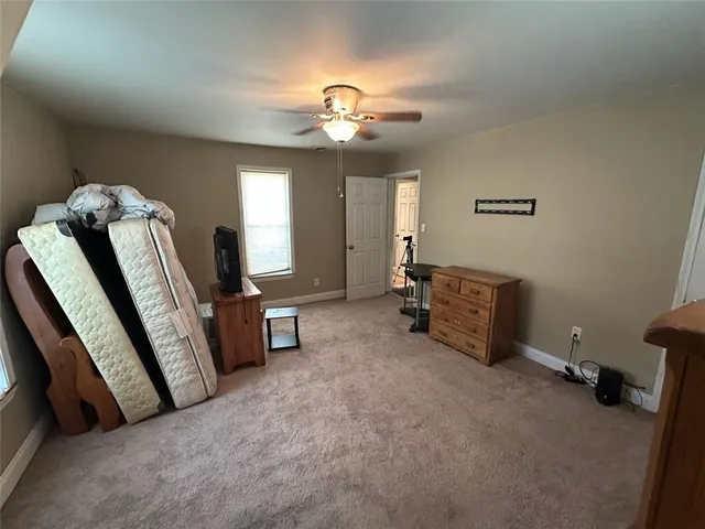 a bathroom with a bathtub and toilet