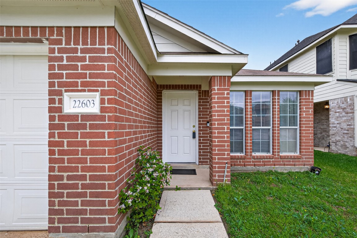 22603 Spring Crossing Drive Spring, TX 77373 - Photo 2 of 29 a front view of a house