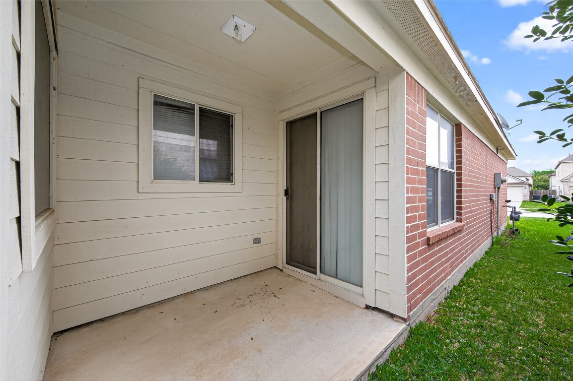22603 Spring Crossing Drive Spring, TX 77373 - Photo 25 of 29 a view of a house with a yard