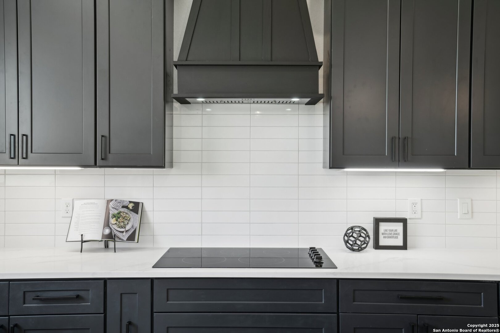 166 Magnolia Meadow Spring Branch, TX 78070 - Photo 13 of 41 a bathroom with a sink and a mirror