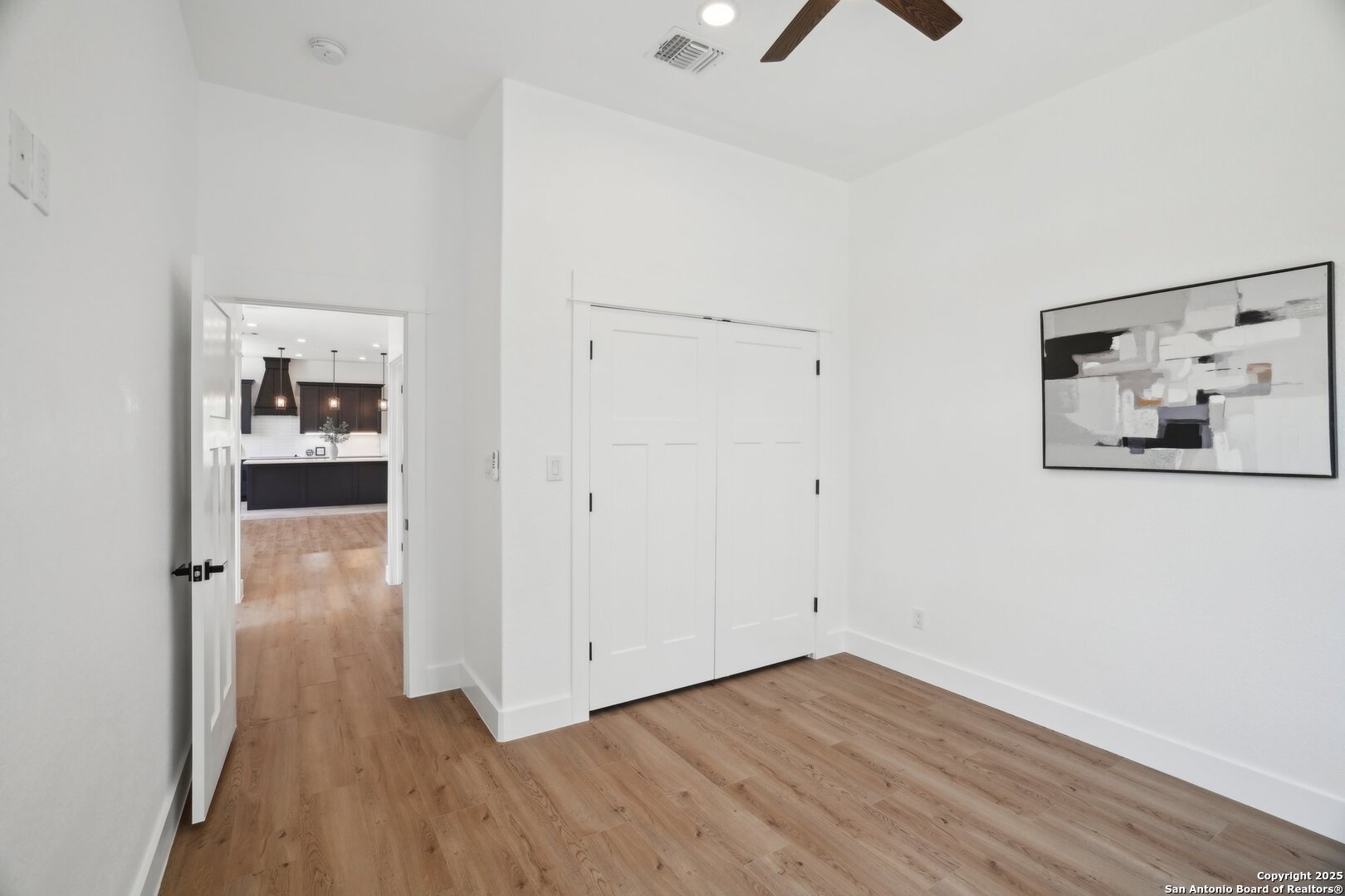 166 Magnolia Meadow Spring Branch, TX 78070 - Photo 17 of 41 wooden floor in an empty room