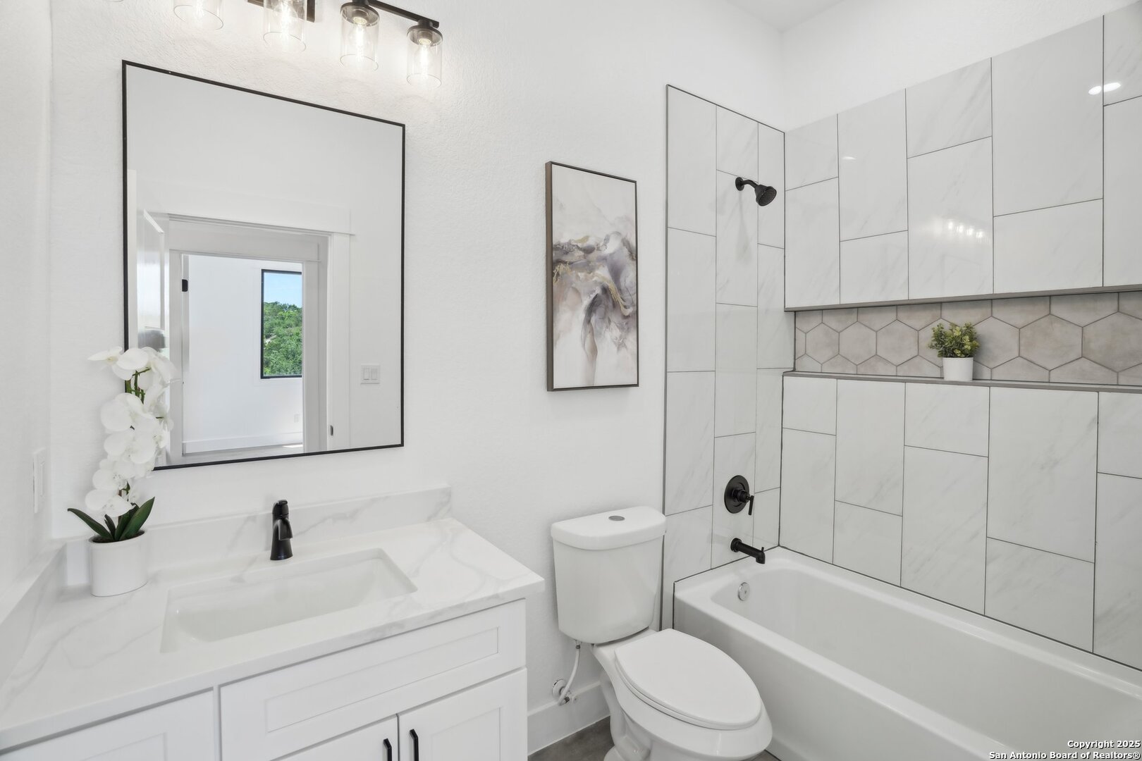 166 Magnolia Meadow Spring Branch, TX 78070 - Photo 20 of 41 a bathroom with a sink a toilet and shower