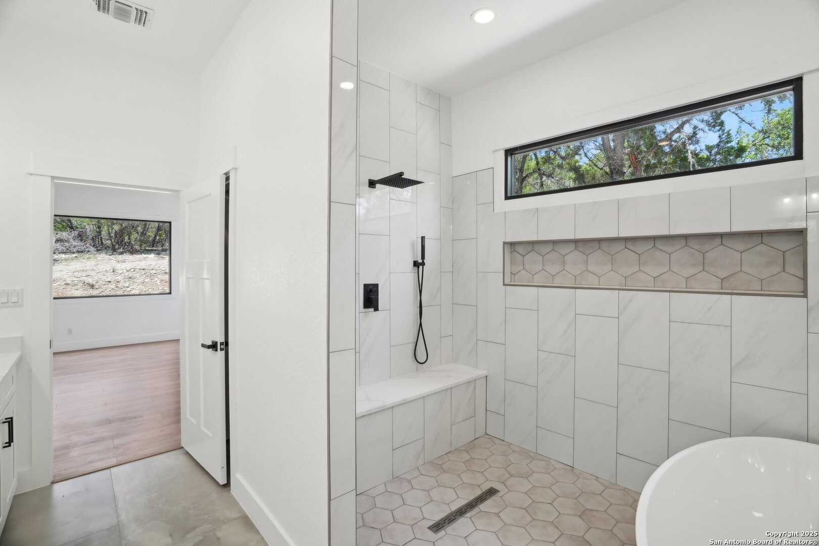 166 Magnolia Meadow Spring Branch, TX 78070 - Photo 29 of 41 a bathroom with a sink a toilet and shower