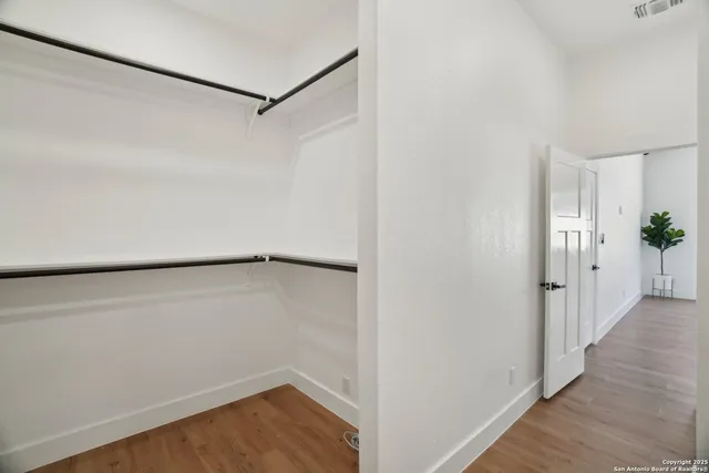 a view of small space with wooden floor