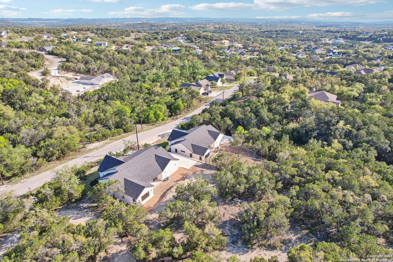 166 Magnolia Meadow Spring Branch, TX 78070 - Photo 40 of 41 an aerial view of residential houses with outdoor space