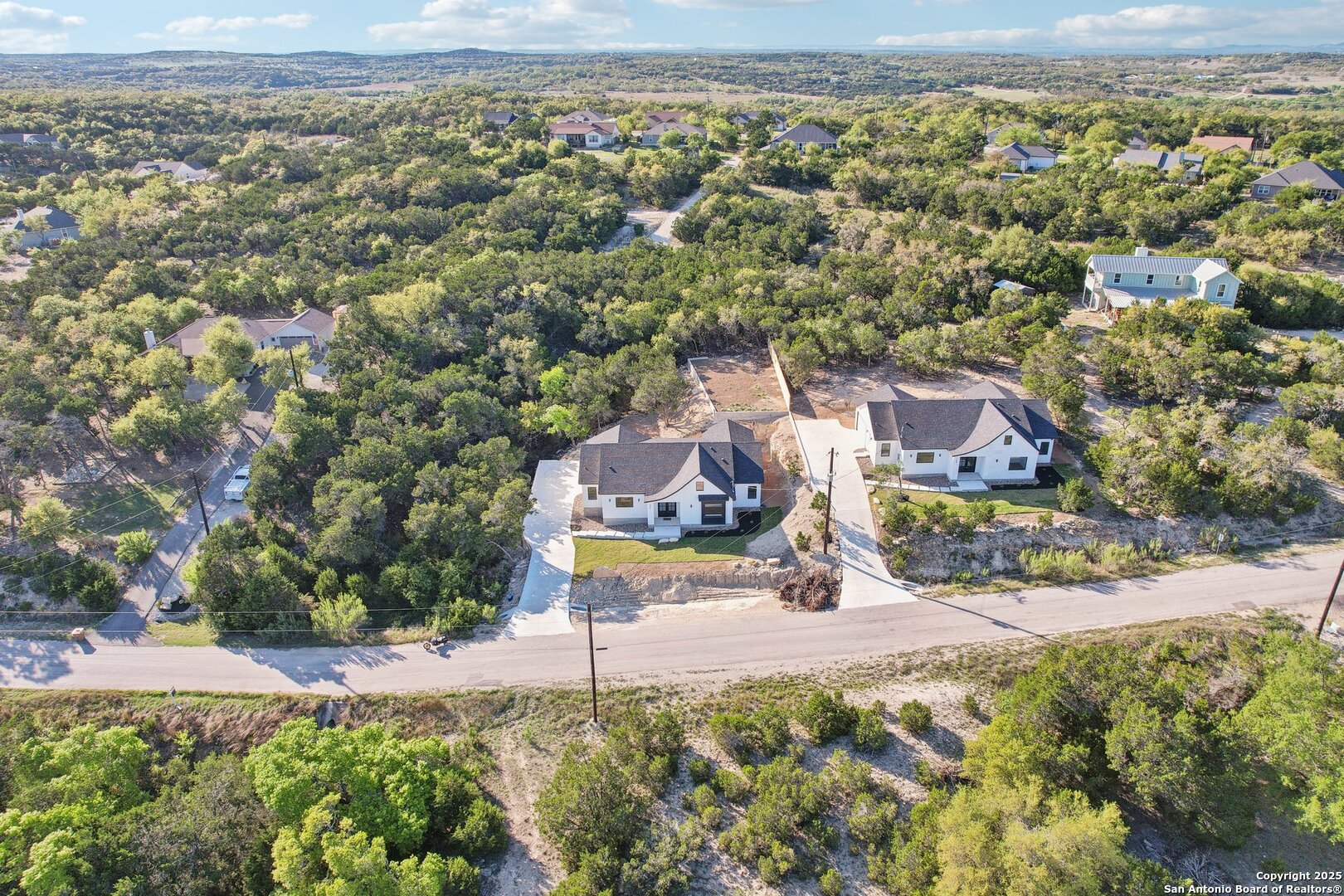 166 Magnolia Meadow Spring Branch, TX 78070 - Photo 41 of 41 an aerial view of residential houses with outdoor space