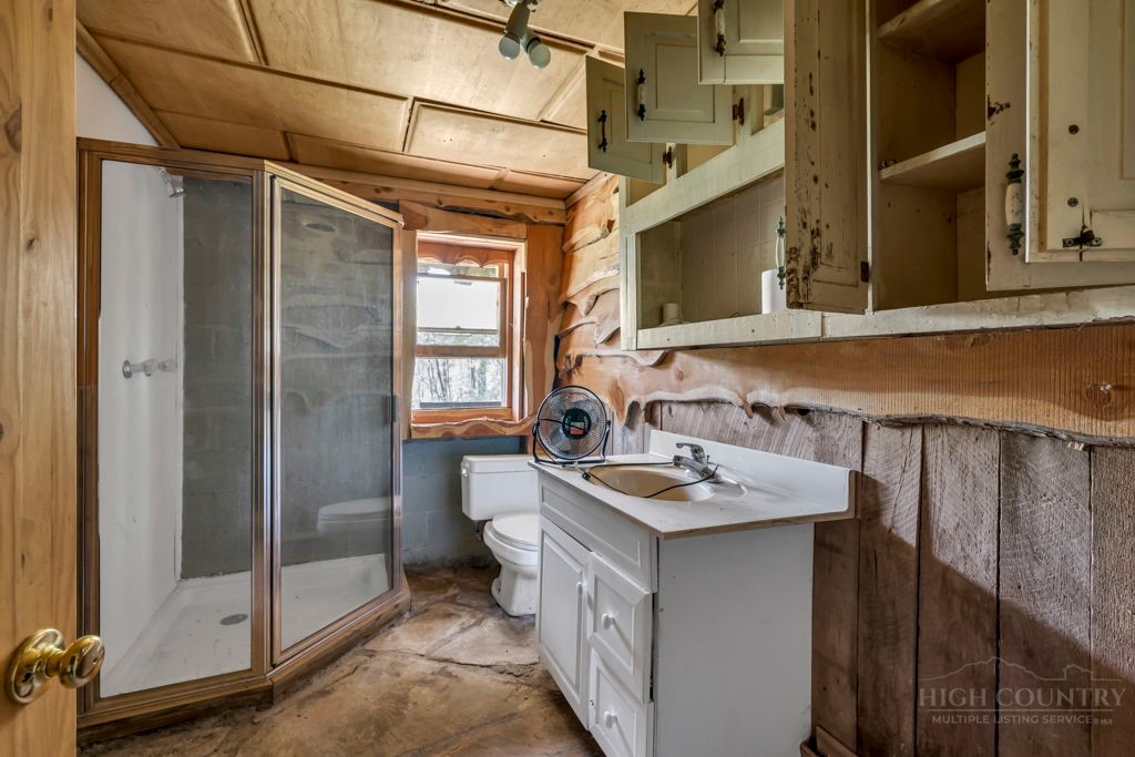 179 Soave Ridge Deep Gap, NC 28618 - Photo 29 of 31 a bathroom with a sink and a mirror