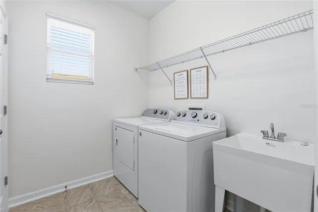 a view of a livingroom with a swimming pool