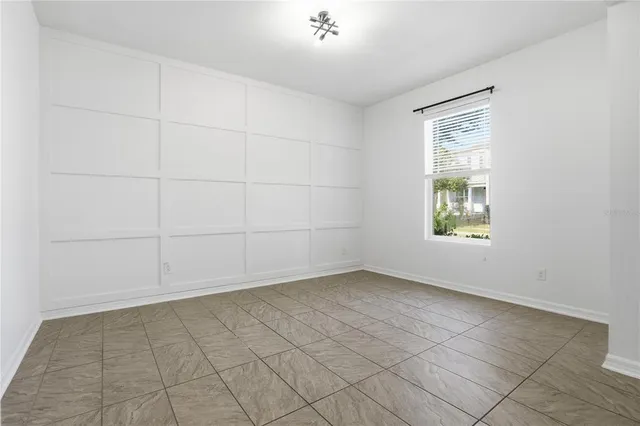 a view of a kitchen with a sink cabinet and a window