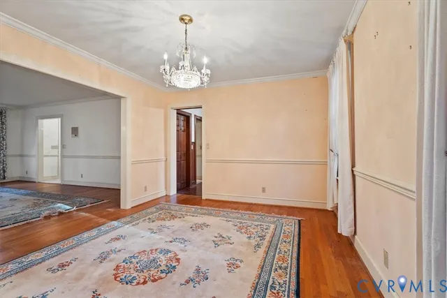 a view of an empty room with stairs