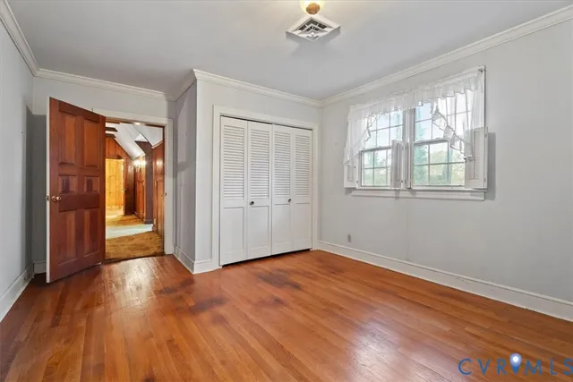 an aerial view of house with yard and outdoor seating