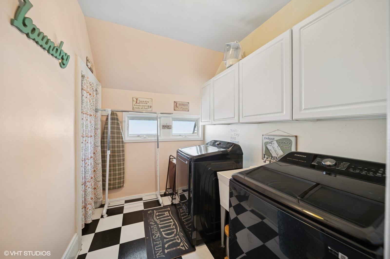 717 Pine Street Michigan City, IN 46360 - Photo 15 of 20 a view of a storage & utility room with washer and dryer