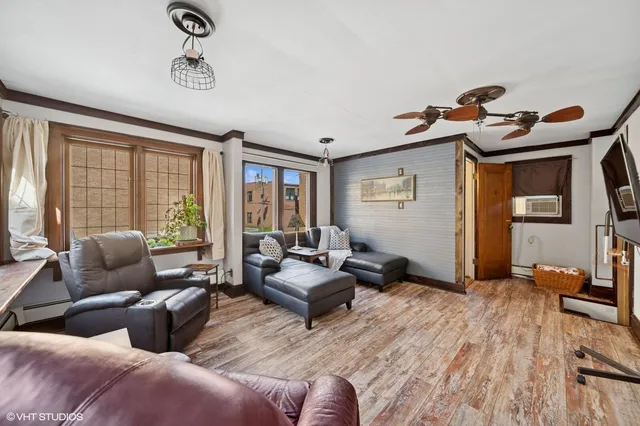 a living room with furniture and a window