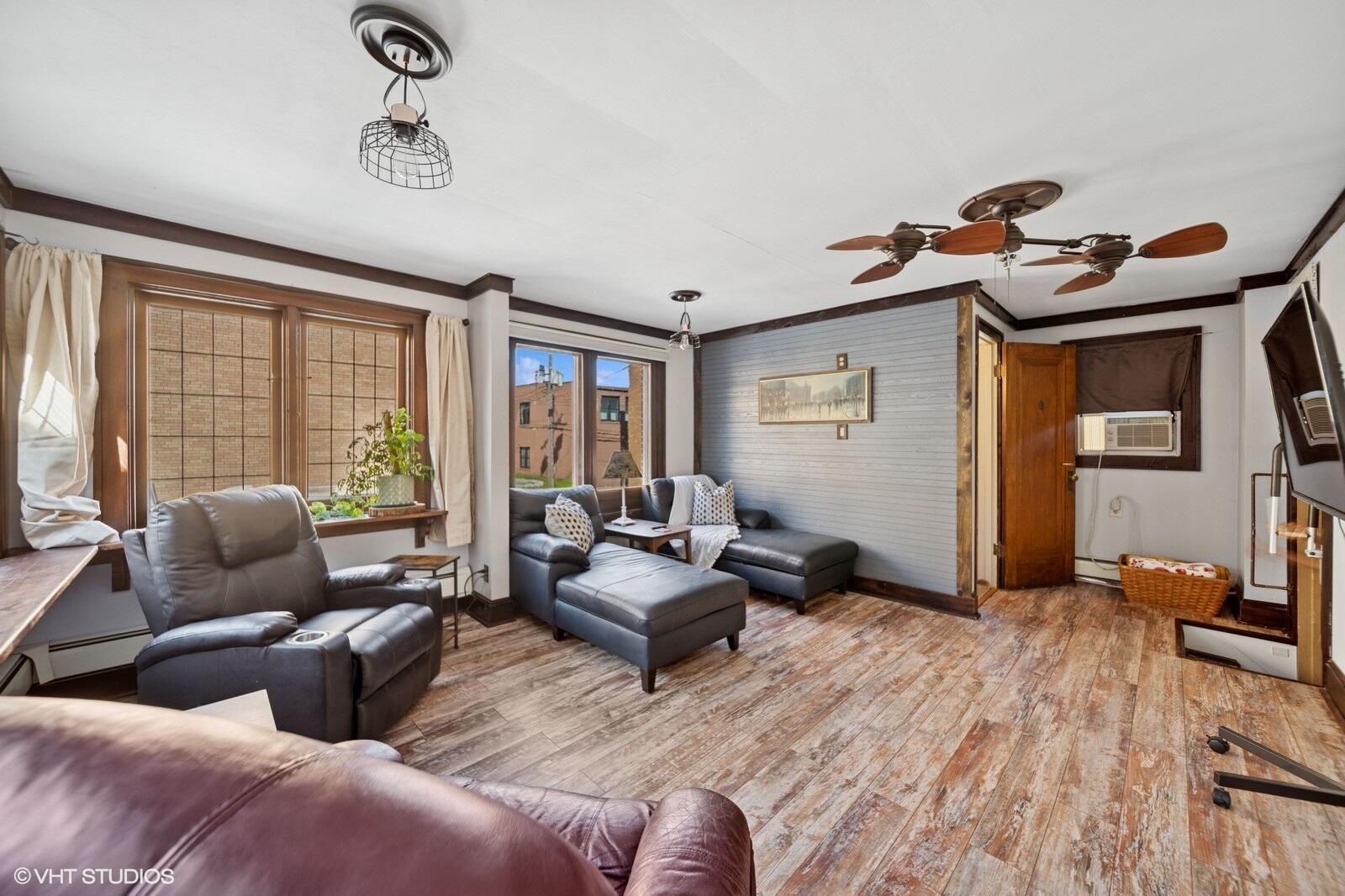 717 Pine Street Michigan City, IN 46360 - Photo 17 of 20 a living room with furniture and a window