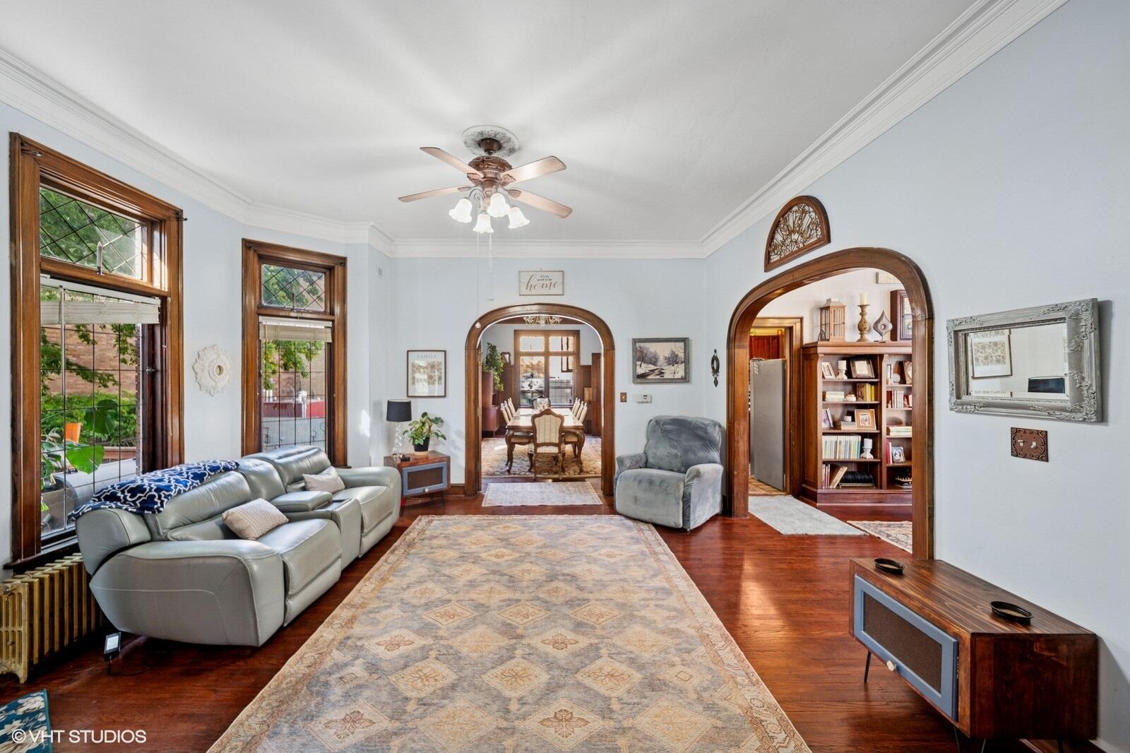 717 Pine Street Michigan City, IN 46360 - Photo 4 of 20 a living room with furniture a wooden floor and a large window