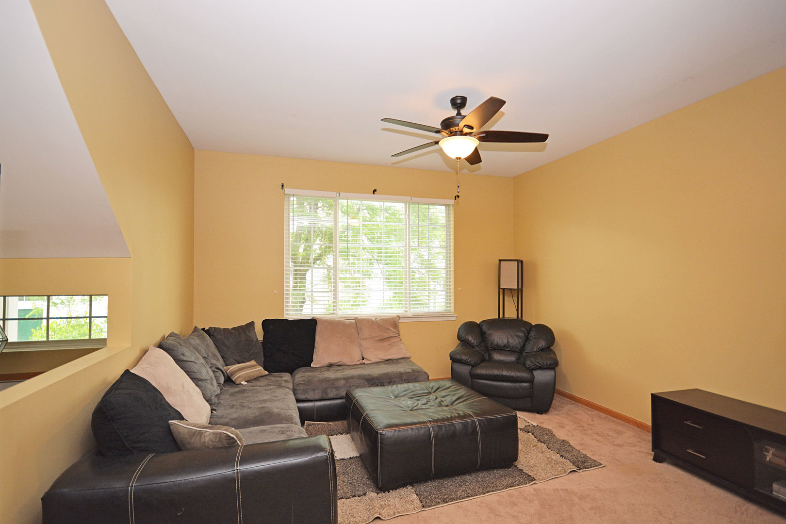 3450 Ravinia Circle Aurora, IL 60504 - Photo 3 of 13 a living room with furniture and a window