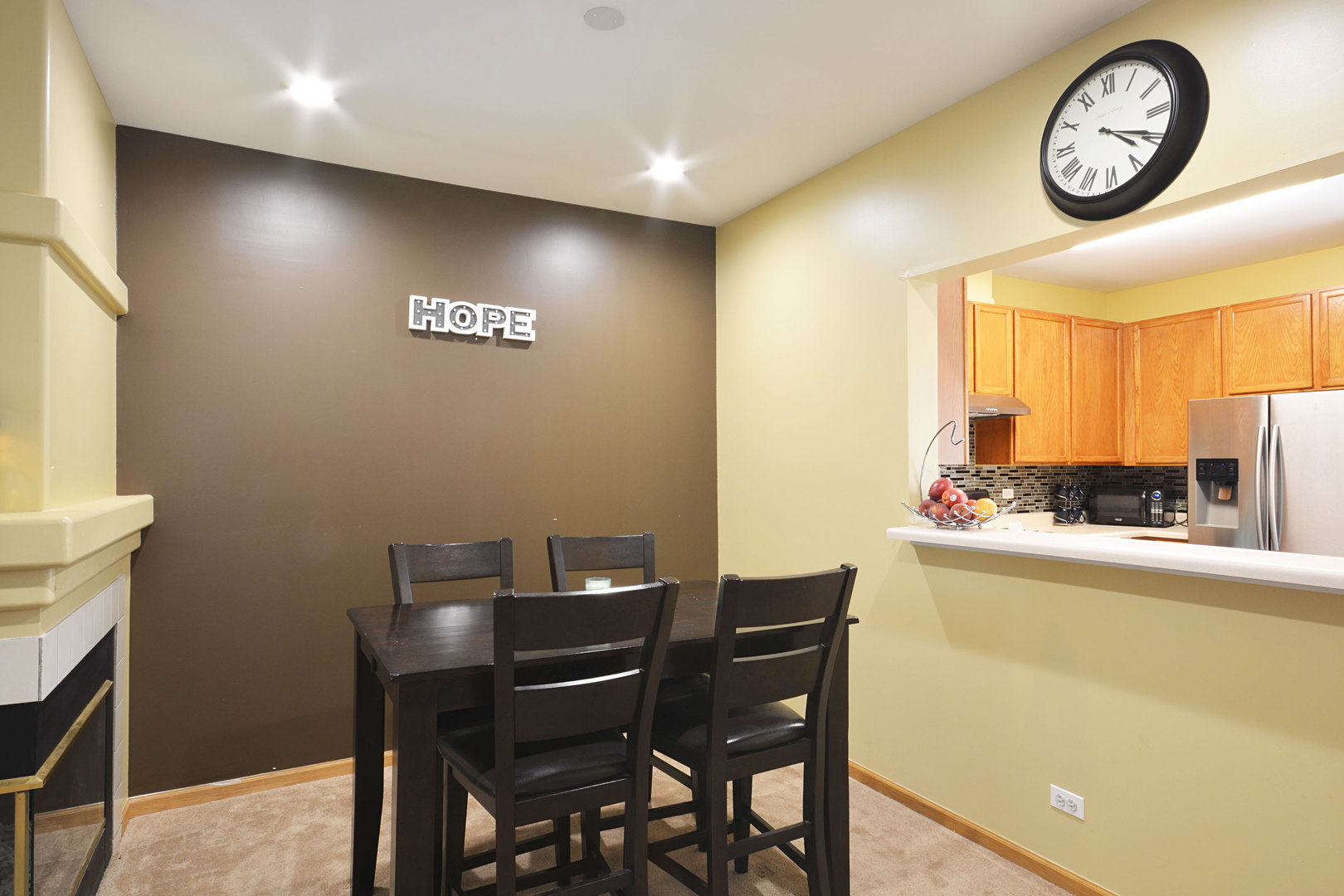 3450 Ravinia Circle Aurora, IL 60504 - Photo 4 of 13 a view of a dining room with furniture