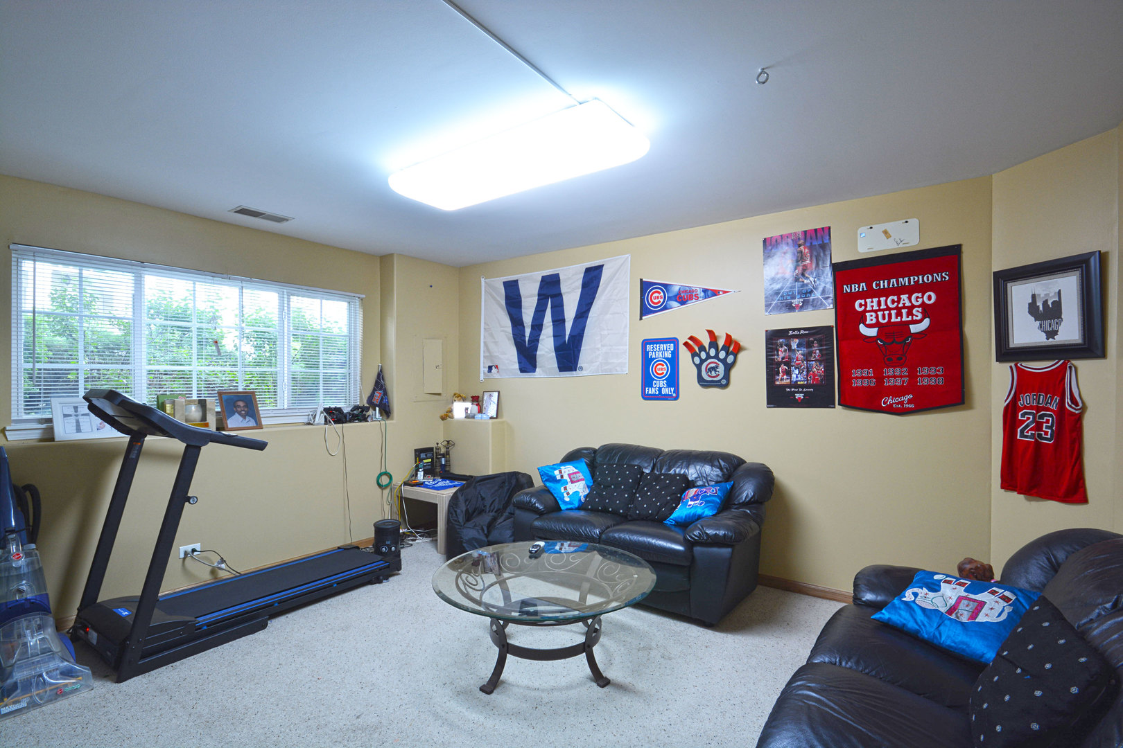 3450 Ravinia Circle Aurora, IL 60504 - Photo 8 of 13 a living room with furniture and a flat screen tv