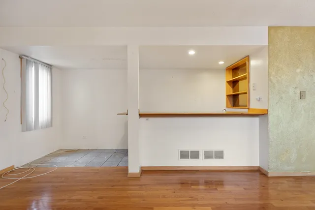 a view of livingroom with hardwood floor and window