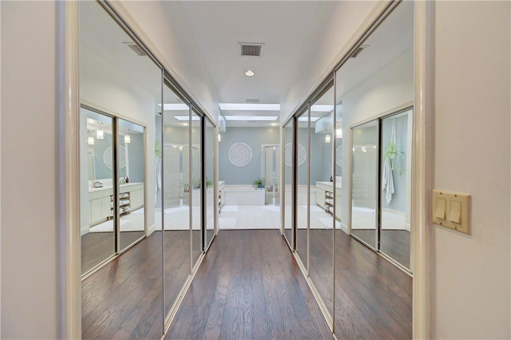 8171 Hampton Wood Drive Boca Raton, FL 33433 - Photo 17 of 56 a view of a hallway with wooden floor