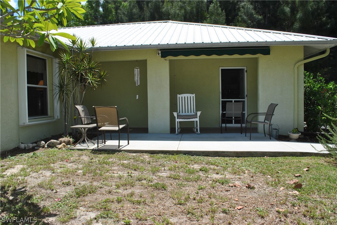 5824 Mackerel Road Bokeelia, FL 33922 - Photo 6 of 25 a view of outdoor space yard and porch
