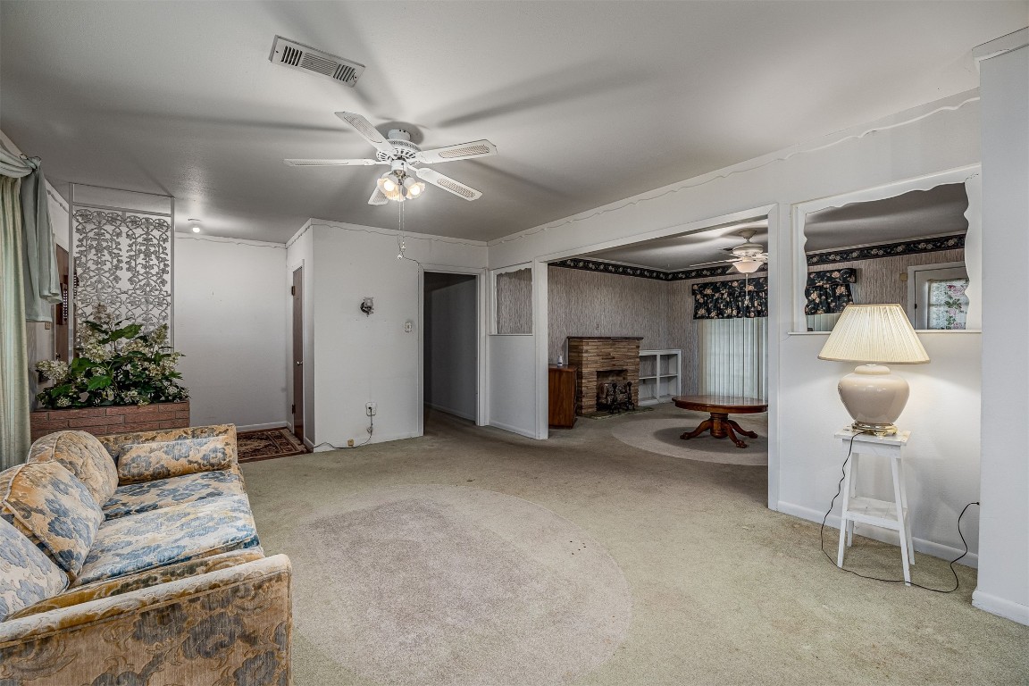 718 Nelson Street Crosby, TX 77532 - Photo 13 of 38 a living room with furniture and a ceiling fan