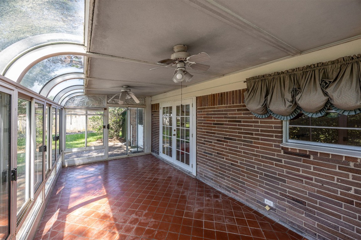 718 Nelson Street Crosby, TX 77532 - Photo 29 of 38 a view of entryway with a floor to ceiling window and wooden floor
