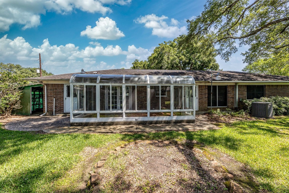 718 Nelson Street Crosby, TX 77532 - Photo 31 of 38 front view of a house with a yard