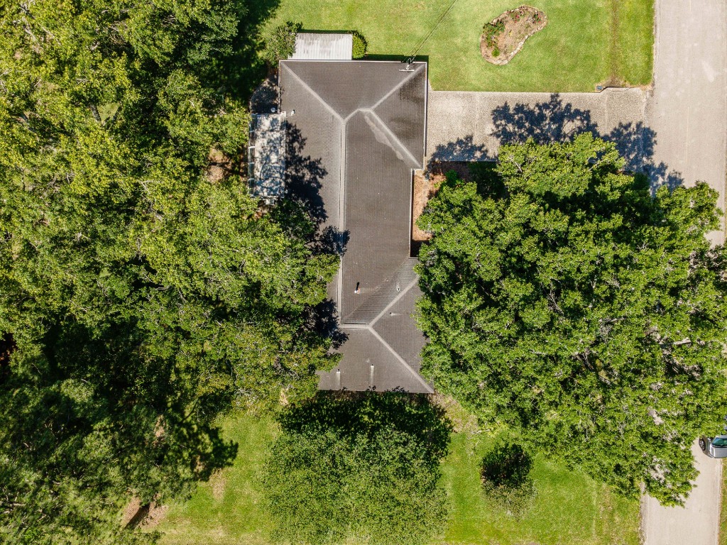 718 Nelson Street Crosby, TX 77532 - Photo 38 of 38 an aerial view of a house with a yard and garden