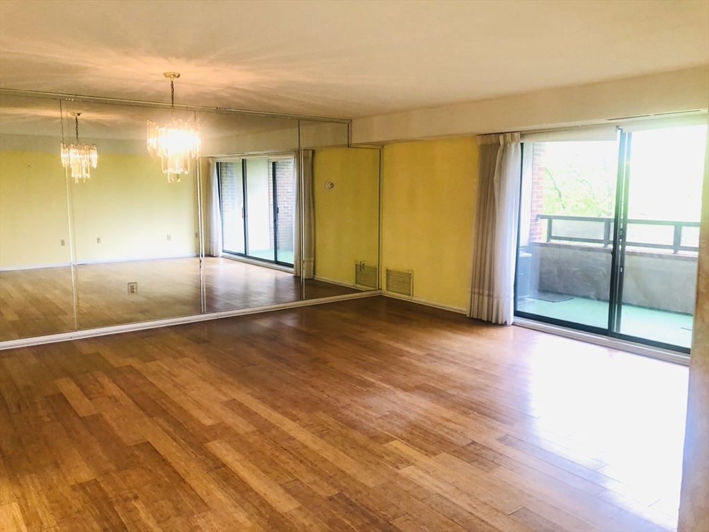 402 Paradise Road, Unit 2L Swampscott, MA 01907 - Photo 7 of 11 a view of an empty room with window