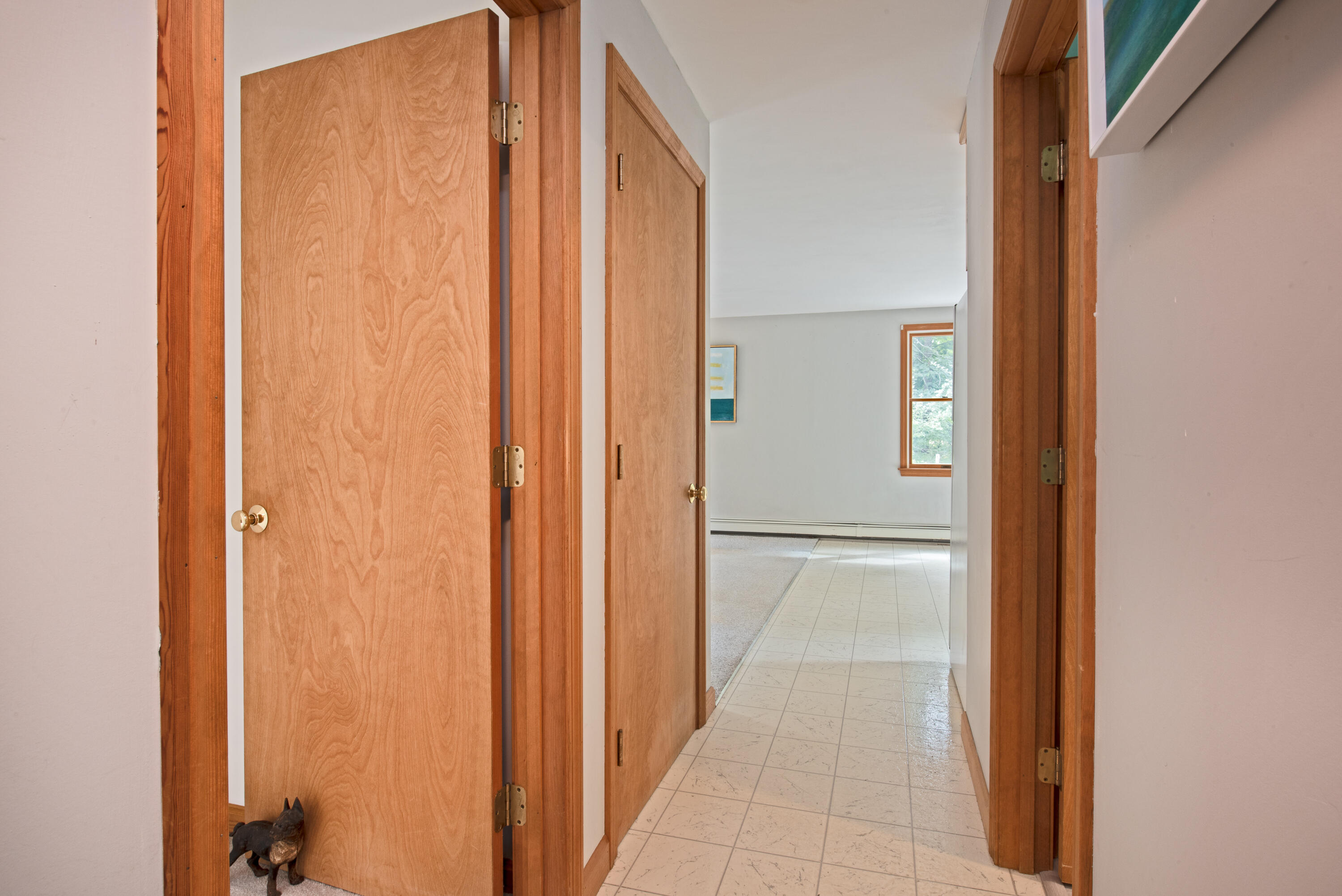 100 Gigi Lane Eastham, MA 02642 - Photo 11 of 30 a view of a bathroom from a hallway