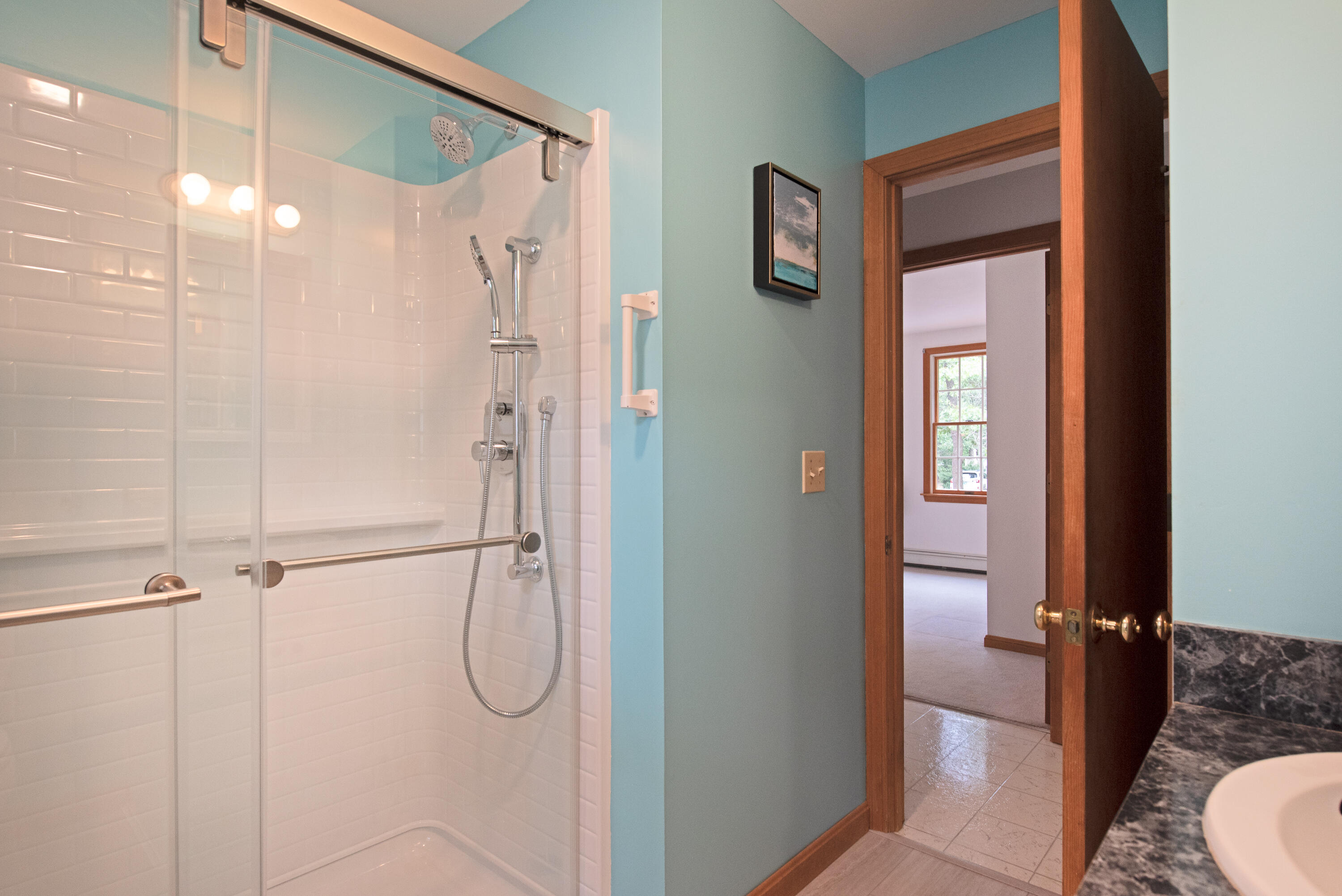 100 Gigi Lane Eastham, MA 02642 - Photo 14 of 30 a bathroom with a glass shower door