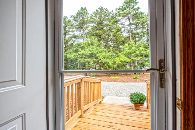 a view of a balcony with chairs