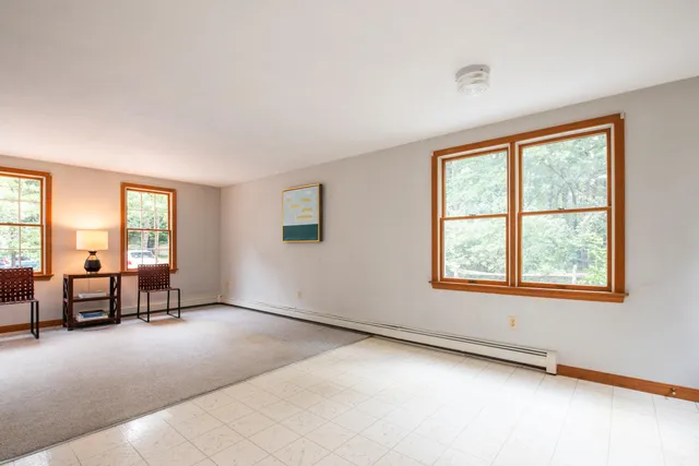 a view of a bathroom from a hallway