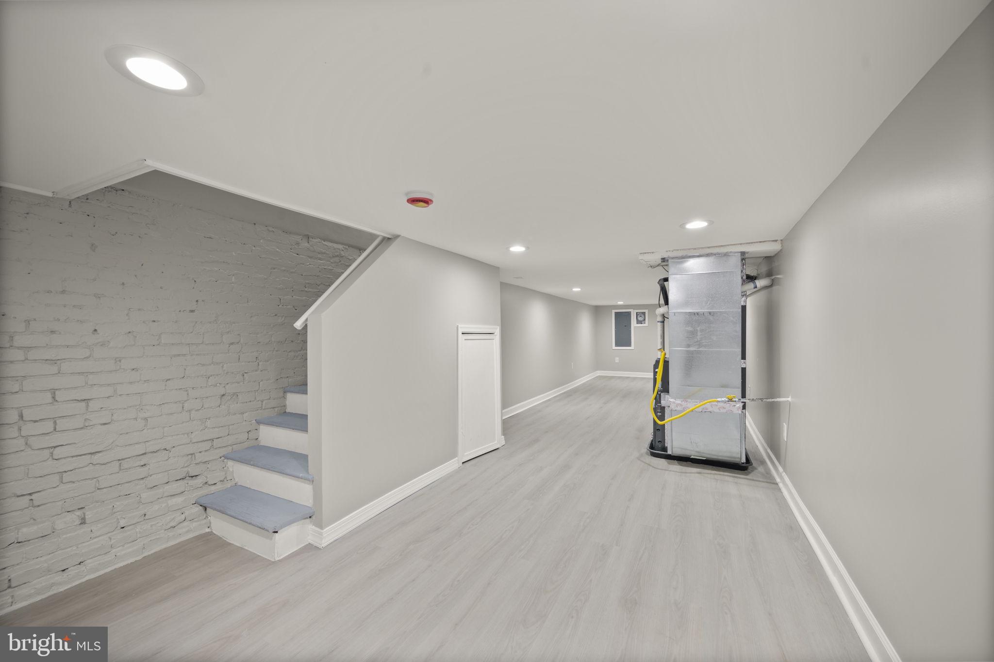 217 North Port Street Baltimore, MD 21224 - Photo 21 of 31 a view of empty room with wooden floor