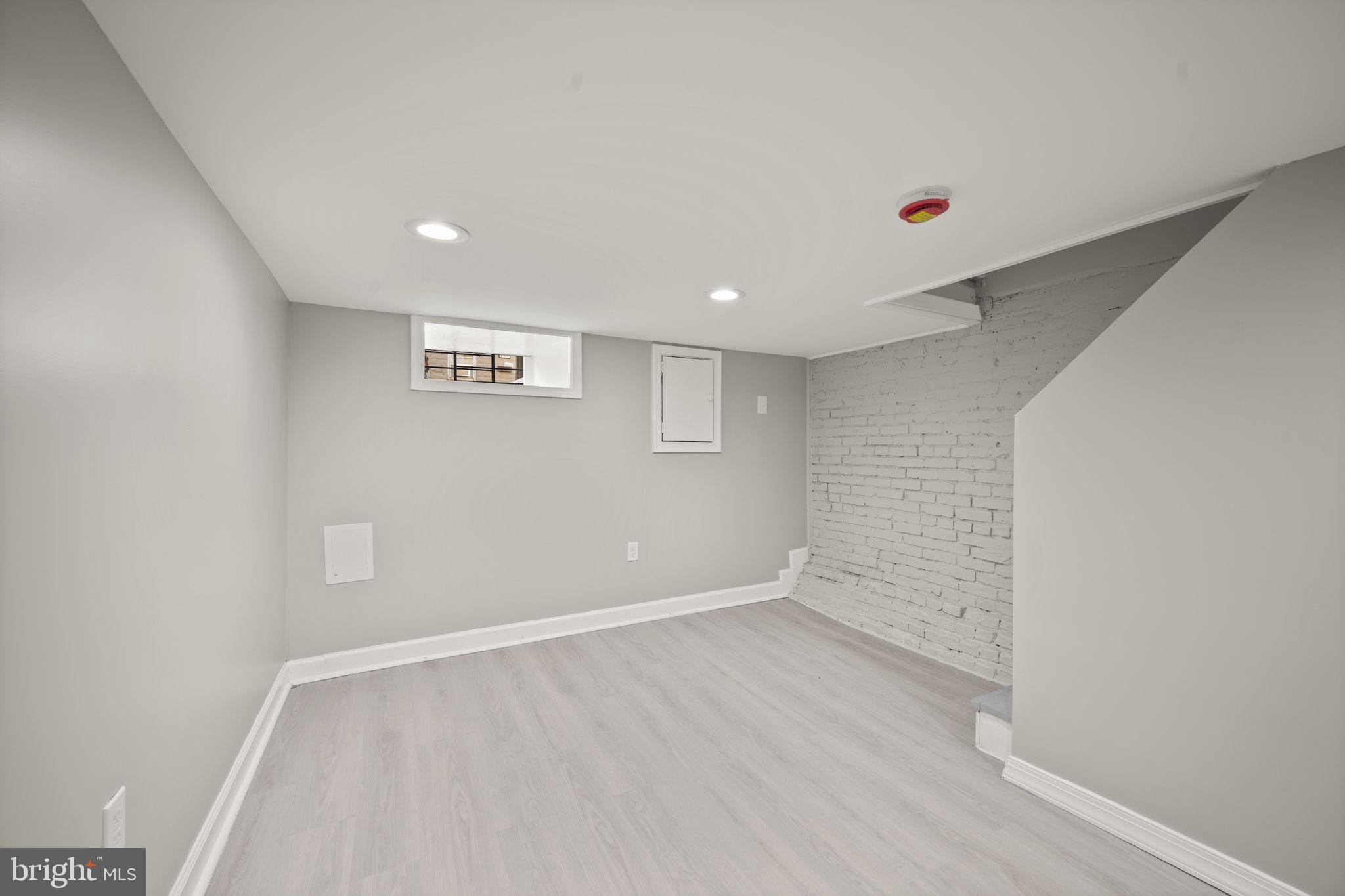 217 North Port Street Baltimore, MD 21224 - Photo 24 of 31 wooden floor in an empty room