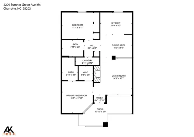 a front view of a building with a garden