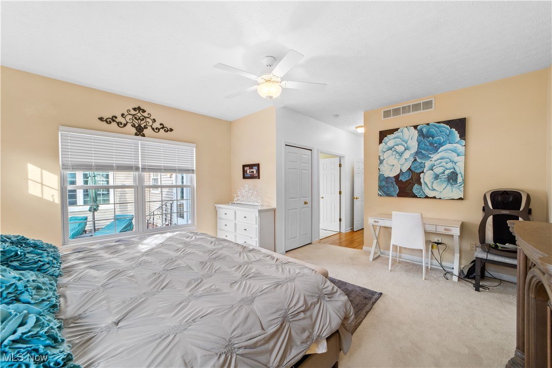 4461 Sexton Road Cleveland, OH 44105 - Photo 15 of 47 Bedroom with light carpet and ceiling fan