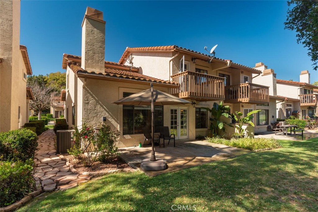 1718 Tecalote Drive, Unit 9 Fallbrook, CA 92028 - Photo 2 of 23 Rear Exterior and patio