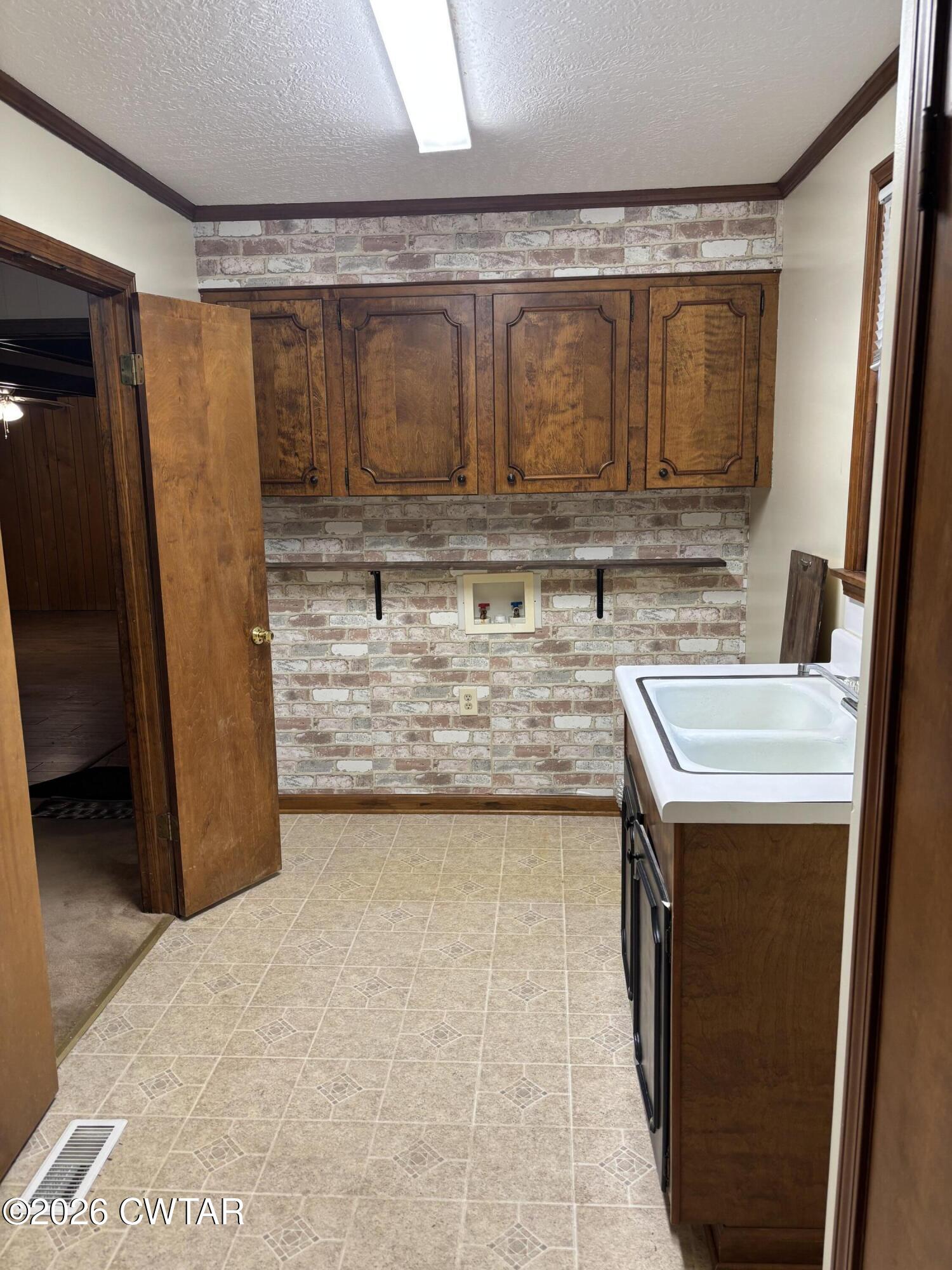 119 Casey Road Pinson, TN 38366 - Photo 9 of 10 a bathroom with a granite countertop sink a mirror and shower
