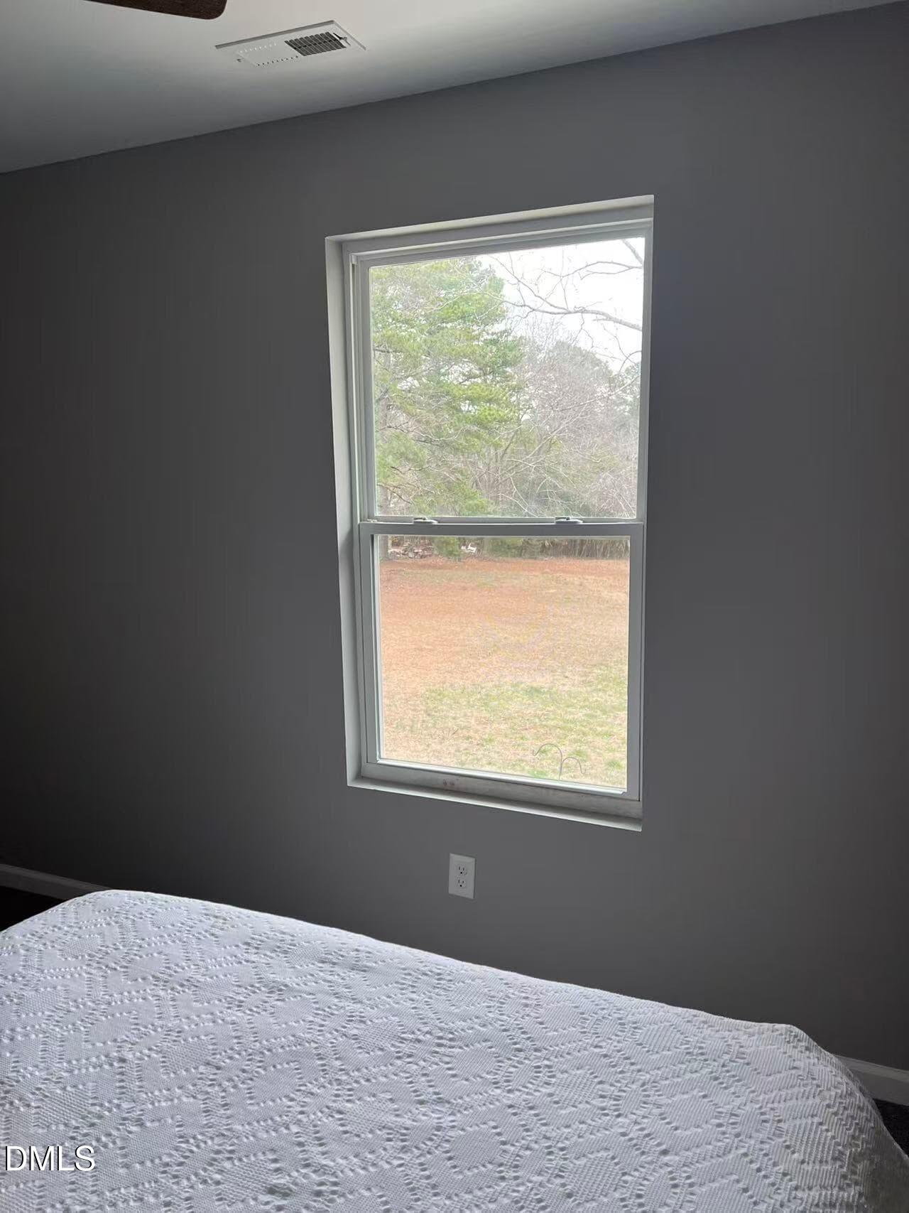 409 Rockingham Street Carthage, NC 28327 - Photo 41 of 56 a view of an empty room and window