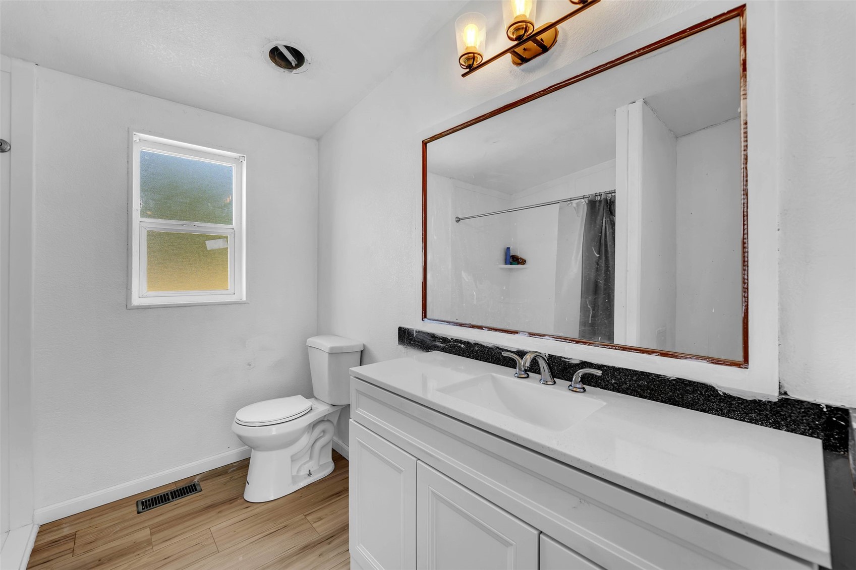 241 Foster Creek Road, Unit B Toledo, WA 98591 - Photo 14 of 22 a bathroom with a sink and a toilet