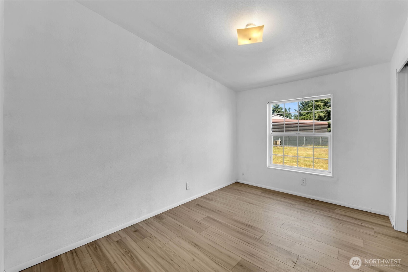 241 Foster Creek Road, Unit B Toledo, WA 98591 - Photo 17 of 22 a view of empty room with window