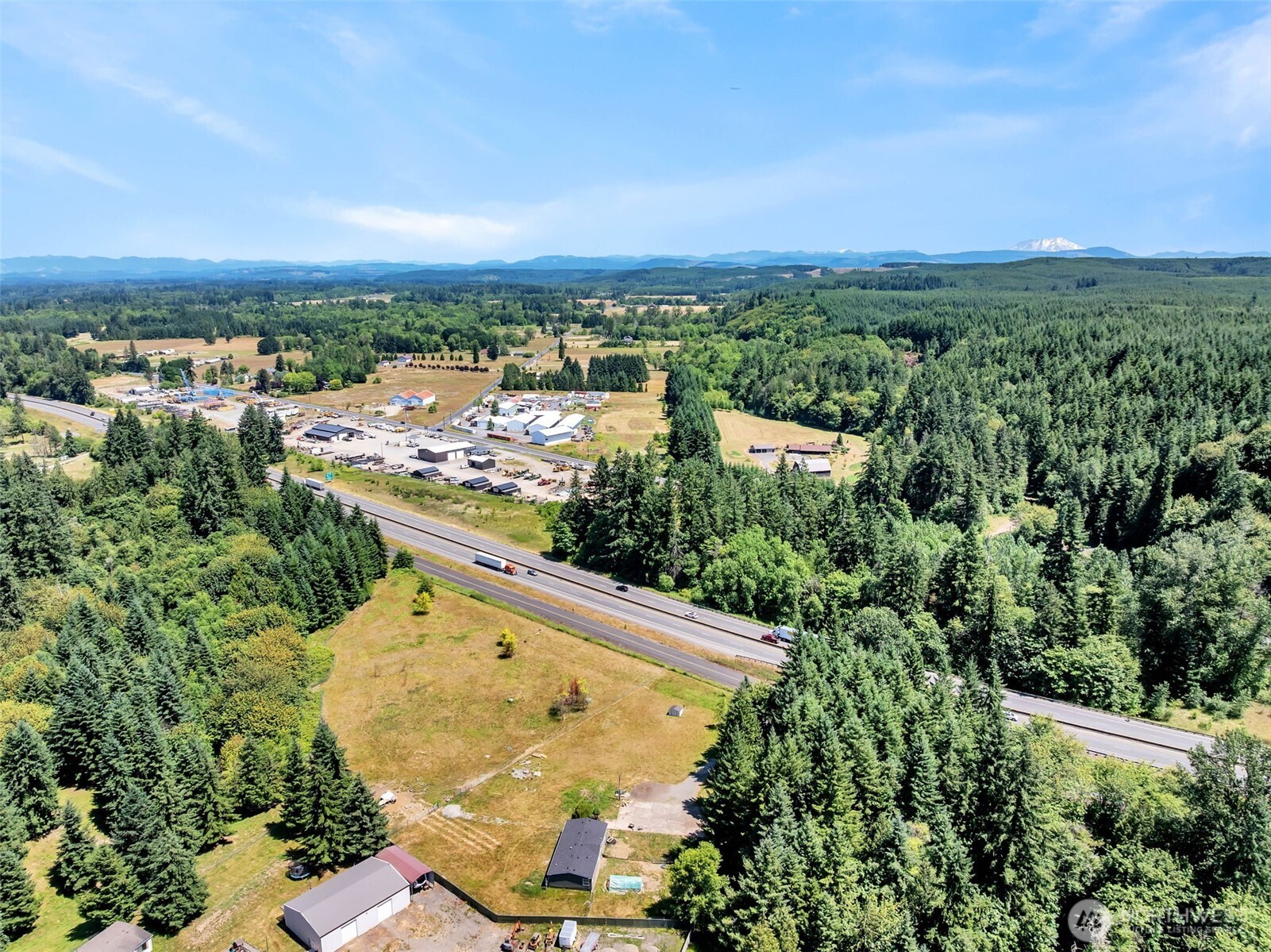 241 Foster Creek Road, Unit B Toledo, WA 98591 - Photo 22 of 22 an aerial view of residential houses with outdoor space and trees