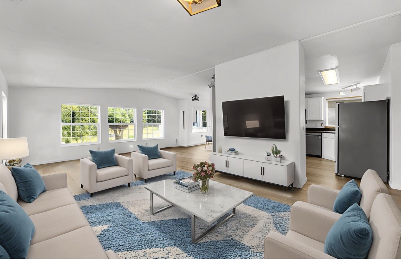 241 Foster Creek Road, Unit B Toledo, WA 98591 - Photo 8 of 22 a living room with furniture and a flat screen tv