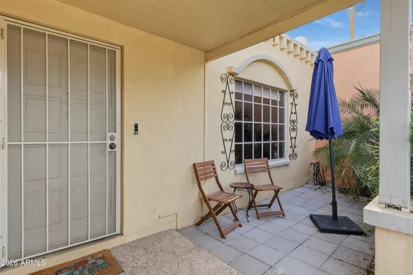 a view of a dining room with furniture window and outside view