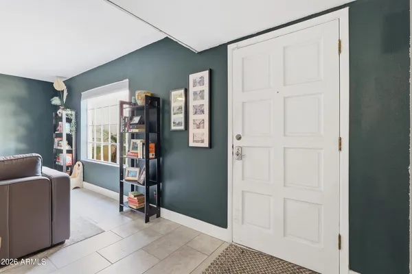 a view of a hallway with staircase